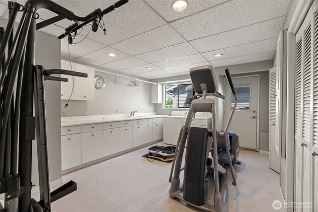 10326 66th Pl W, Mukilteo, WA 98275 - workout room with washing machine and dryer, a sink, recessed lighting, and a paneled ceiling