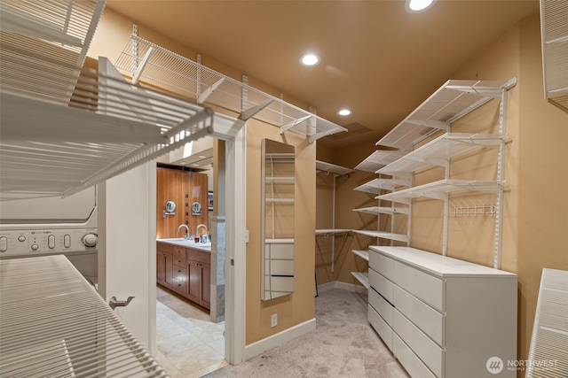 10326 66th Pl W, Mukilteo, WA 98275 - spacious closet featuring washer / clothes dryer, light carpet, and a sink