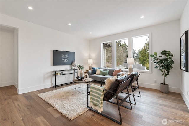 8232 21st Ave NE, Seattle, WA 98115 - living room with baseboards, recessed lighting, and wood finished floors