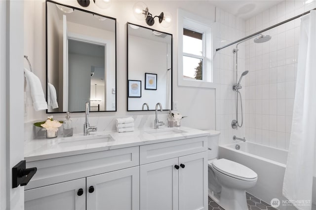 8232 21st Ave NE, Seattle, WA 98115 - bathroom featuring shower / tub combo with curtain, double vanity, and toilet