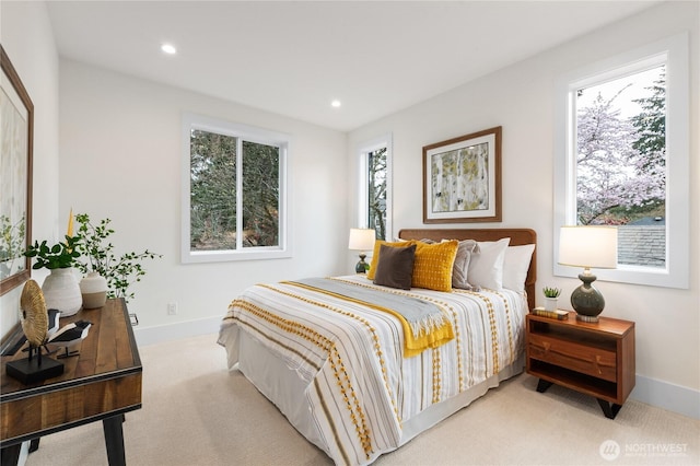 8232 21st Ave NE, Seattle, WA 98115 - bedroom featuring light colored carpet, baseboards, and recessed lighting