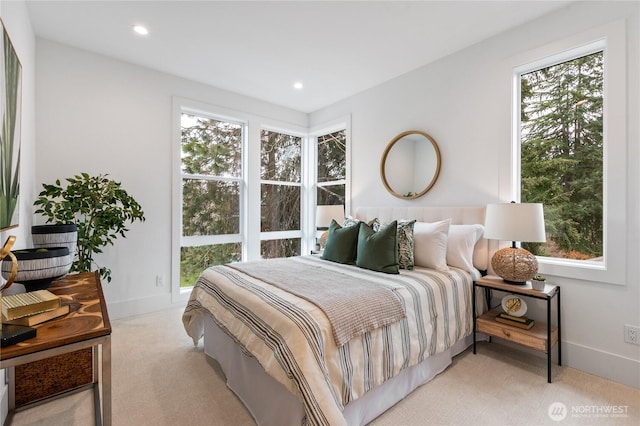 8232 21st Ave NE, Seattle, WA 98115 - bedroom featuring light colored carpet, baseboards, and recessed lighting