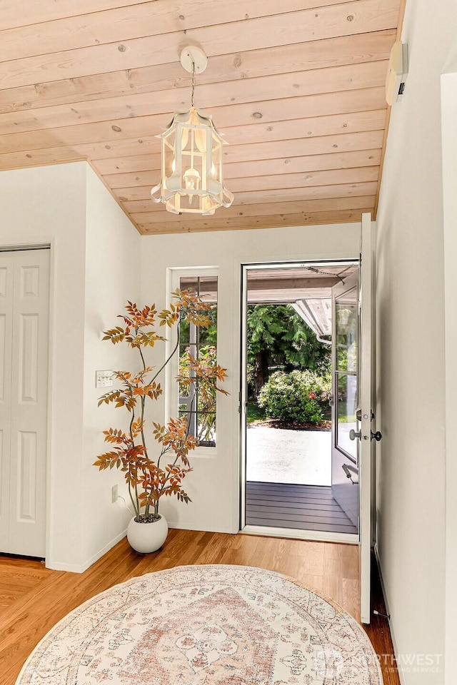 2847 Viewmont Pl, Camano Island, WA 98282 - foyer with a chandelier, wood ceiling, and wood finished floors