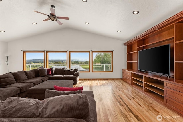 139 Coulson Rd, Chehalis, WA 98532 - living room with lofted ceiling, light wood-style flooring, healthy amount of natural light, ceiling fan, and recessed lighting