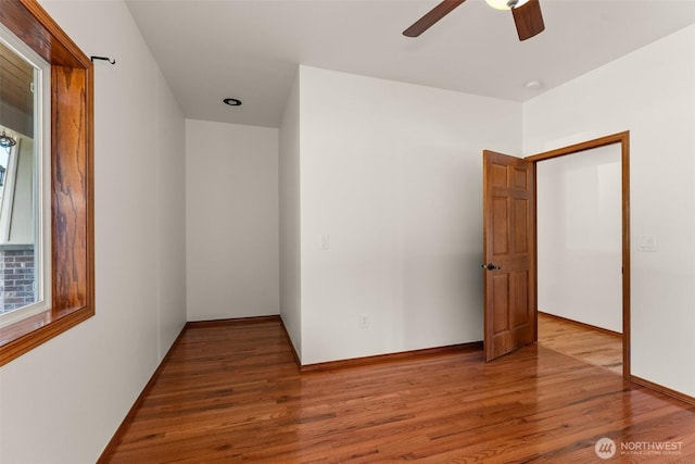 139 Coulson Rd, Chehalis, WA 98532 - unfurnished bedroom with wood finished floors, a ceiling fan, and baseboards