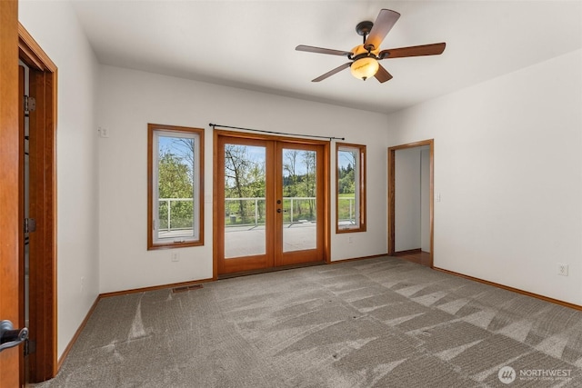 139 Coulson Rd, Chehalis, WA 98532 - carpeted empty room featuring french doors, a ceiling fan, and baseboards