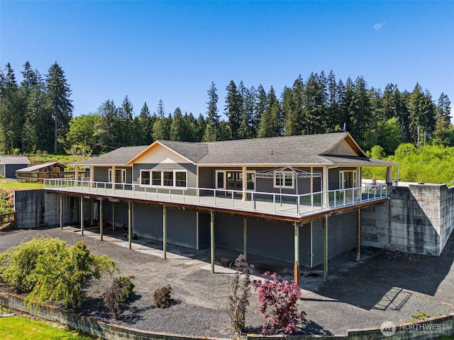 139 Coulson Rd, Chehalis, WA 98532 - rear view of property featuring a deck and a wooded view
