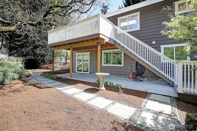 8612 NE 133rd St, Kirkland, WA 98034 - rear view of property with stairs, a patio, and a wooden deck