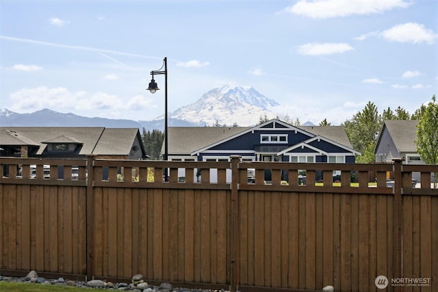 14651 Crestwood Pl E, Bonney Lake, WA 98391 - view of yard featuring fence, a mountain view, and a residential view
