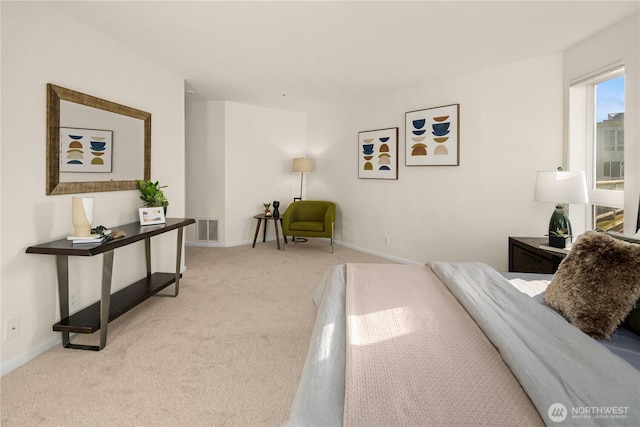 carpeted bedroom with baseboards