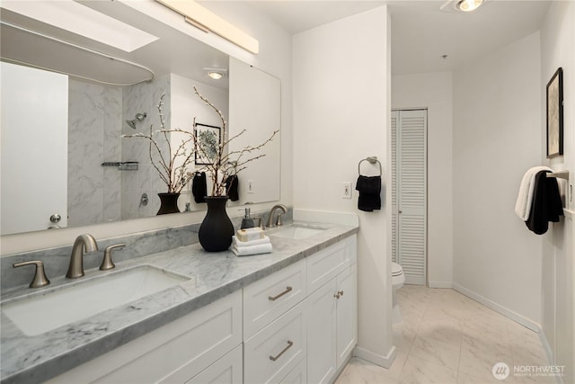 full bathroom featuring marble look tiles, a closet, double vanity, toilet, and a shower