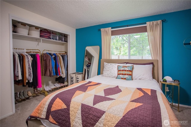 2622 Scotlac Ct SW, Olympia, WA 98512 - bedroom with carpet, a closet, and a textured ceiling