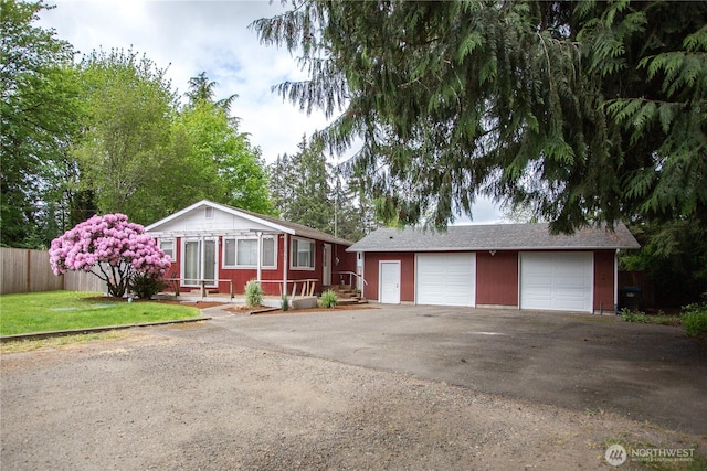 2622 Scotlac Ct SW, Olympia, WA 98512 - single story home featuring an outbuilding, a garage, fence, and asphalt driveway