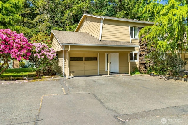 3217 Yelm Hwy Unit 5, Olympia, WA 98501 - view of front of property featuring an attached garage and asphalt driveway