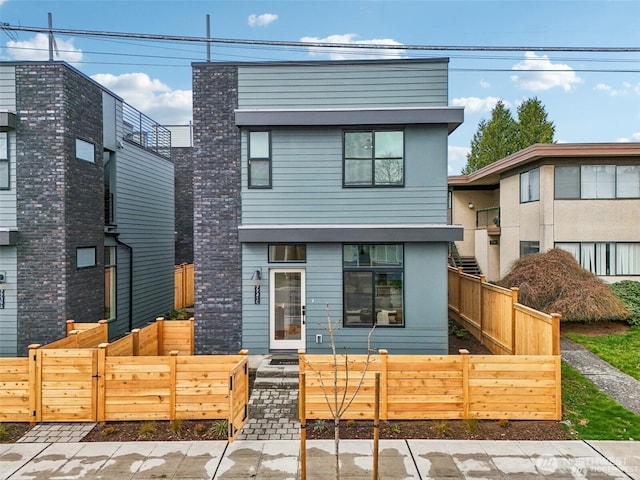 7741 15th Ave NE Unit B, Seattle, WA 98115 - modern home featuring a fenced front yard