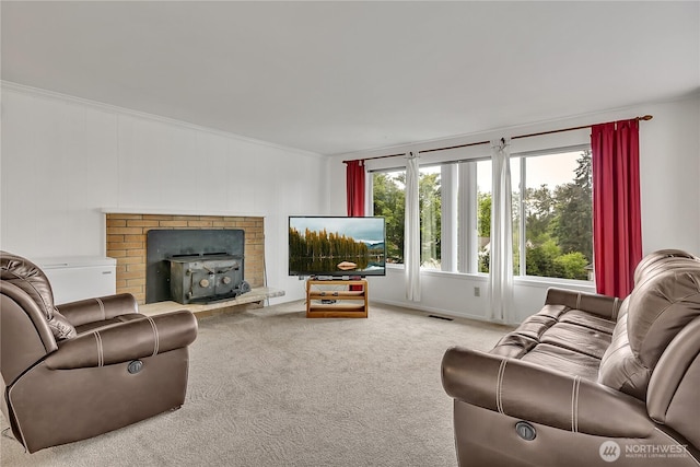 12416 SE 210th St, Kent, WA 98031 - living area with carpet floors, crown molding, and a wood stove