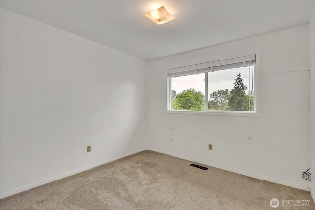 12416 SE 210th St, Kent, WA 98031 - empty room featuring light carpet and baseboards