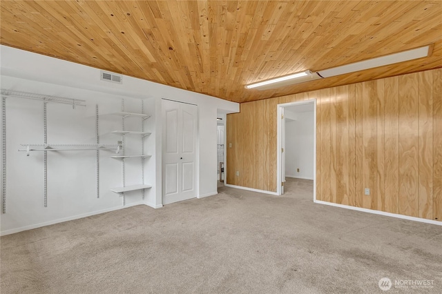 12416 SE 210th St, Kent, WA 98031 - unfurnished bedroom featuring wood ceiling, carpet floors, and wood walls