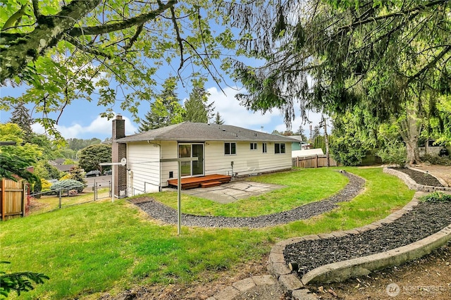 12416 SE 210th St, Kent, WA 98031 - rear view of house with a chimney, a deck, and a gate