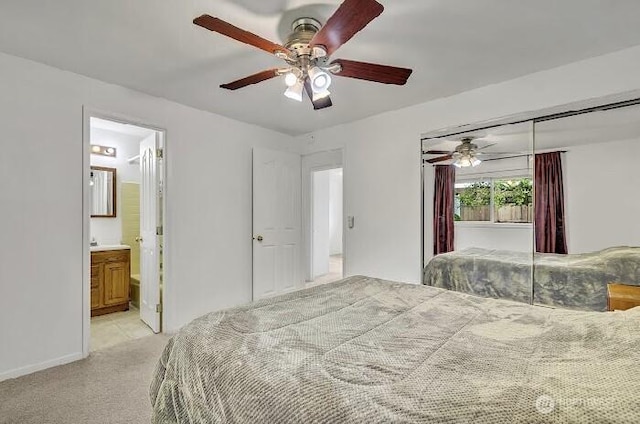 12416 SE 210th St, Kent, WA 98031 - bedroom featuring light colored carpet, a closet, a ceiling fan, and baseboards