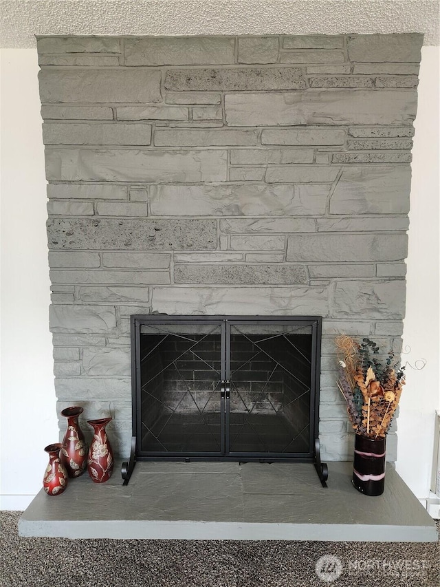 1476 W Sunset Dr, Moses Lake, WA 98837 - detailed view of a fireplace with raised hearth