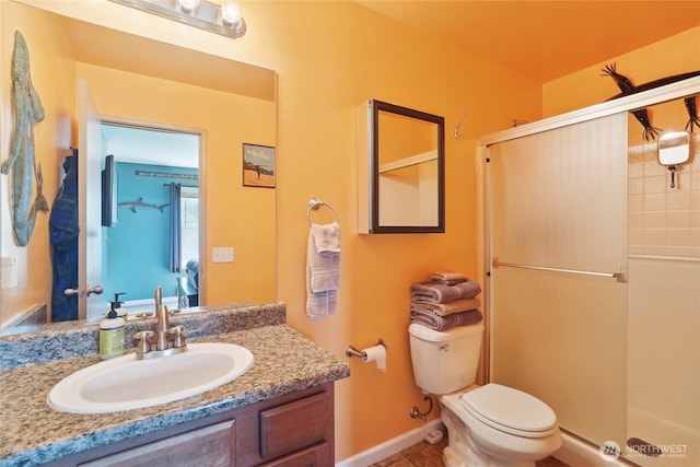 5377 Timber Ridge Dr, Mount Vernon, WA 98273 - bathroom with a stall shower, toilet, vanity, and baseboards