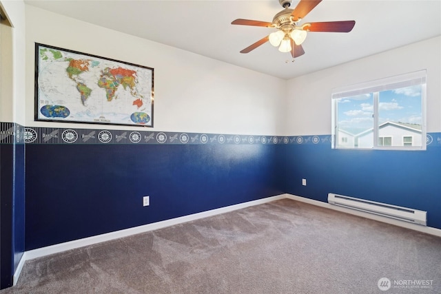 5377 Timber Ridge Dr, Mount Vernon, WA 98273 - carpeted empty room with a baseboard heating unit, ceiling fan, and baseboards
