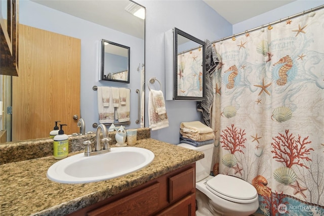 5377 Timber Ridge Dr, Mount Vernon, WA 98273 - bathroom with toilet, vanity, and curtained shower