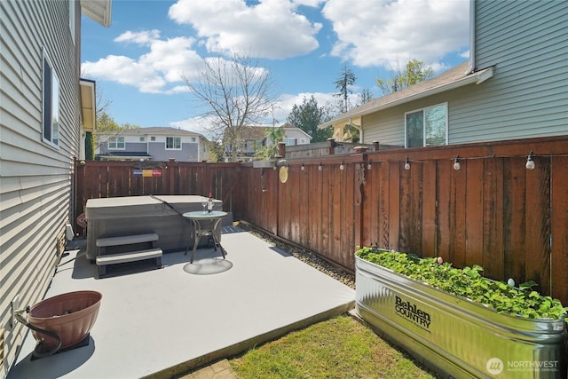 5377 Timber Ridge Dr, Mount Vernon, WA 98273 - view of patio with a hot tub and fence