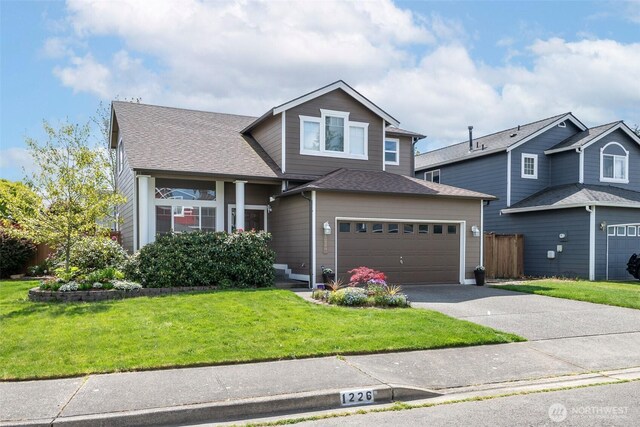 1226 57th Ct SE, Auburn, WA 98092 - traditional-style house with concrete driveway and a shingled roof