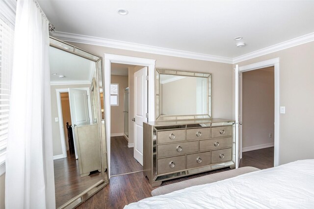 1226 57th Ct SE, Auburn, WA 98092 - bedroom featuring dark wood finished floors, ornamental molding, and baseboards