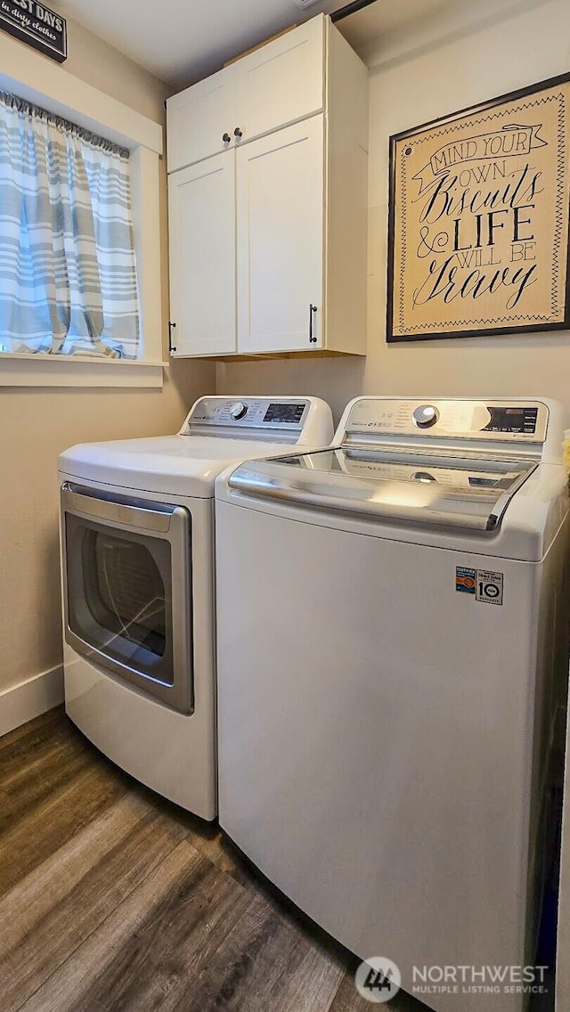8002 172nd Pl NE, Arlington, WA 98223 - laundry area with washer and dryer, cabinet space, and dark wood finished floors