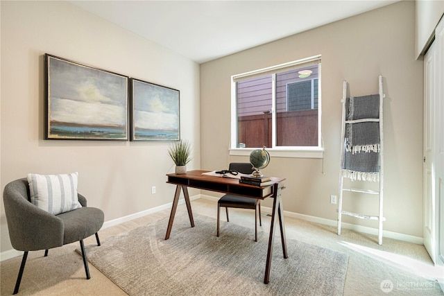 office area featuring carpet floors and baseboards