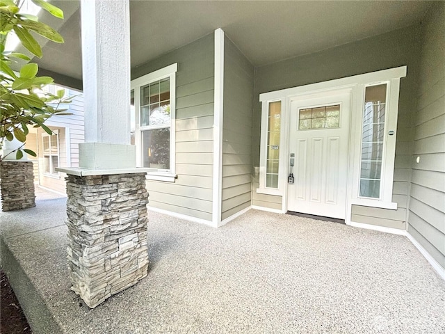 property entrance with a porch