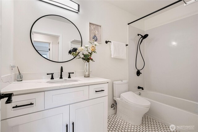 2333 NE 94th St, Seattle, WA 98115 - bathroom with vanity, toilet, tile patterned flooring, and washtub / shower combination