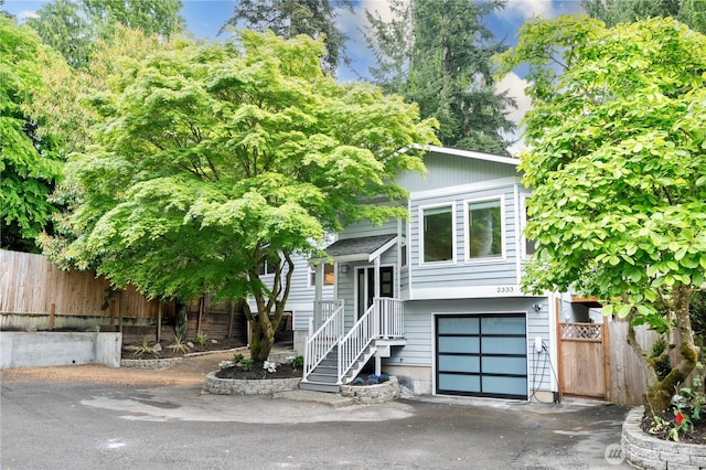 2333 NE 94th St, Seattle, WA 98115 - view of front of home with fence and a garage