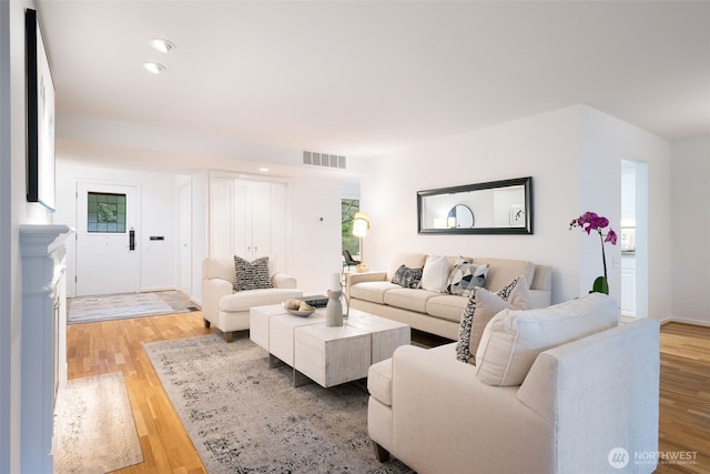 living area featuring light wood-style flooring