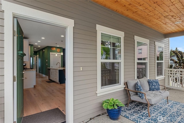 210 E Cedarland Ln, Allyn, WA 98524 - exterior space featuring a sink and a porch