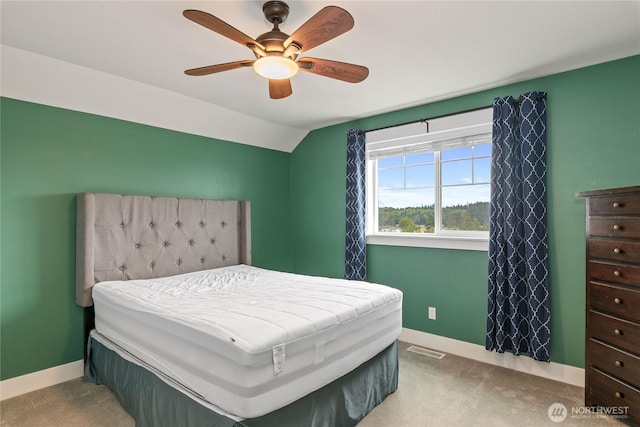 210 E Cedarland Ln, Allyn, WA 98524 - bedroom featuring baseboards, carpet floors, vaulted ceiling, and ceiling fan