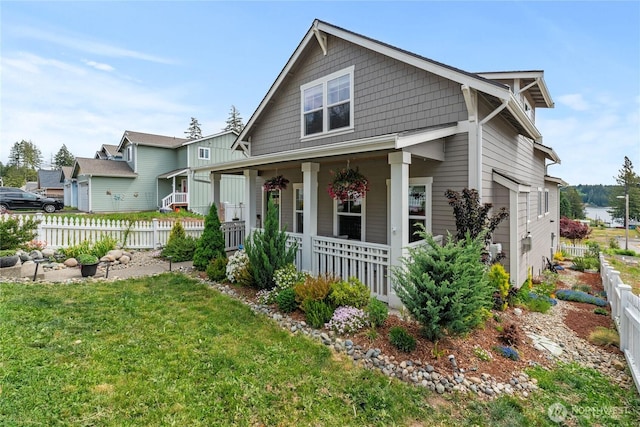 210 E Cedarland Ln, Allyn, WA 98524 - view of front of house featuring covered porch