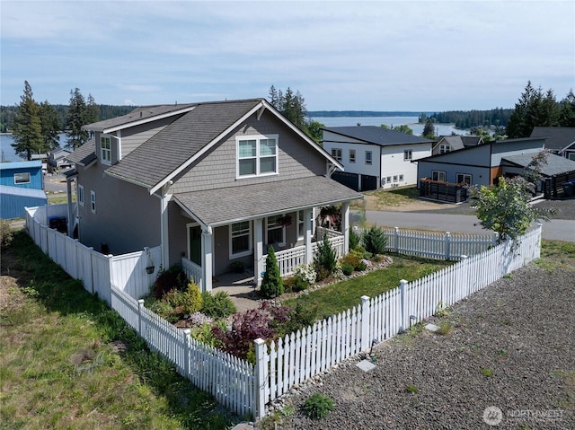 210 E Cedarland Ln, Allyn, WA 98524 - view of front of house with a porch and a shingled roof