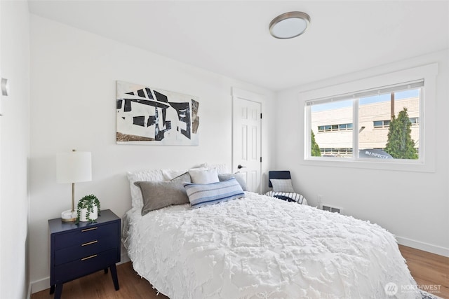 3009 Heath Ct, Steilacoom, WA 98388 - bedroom featuring wood finished floors and baseboards