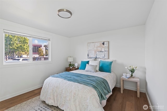 3009 Heath Ct, Steilacoom, WA 98388 - bedroom featuring baseboards and wood finished floors