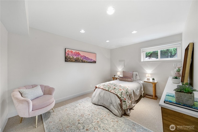 carpeted bedroom featuring baseboards and recessed lighting