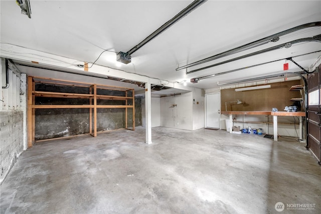 garage featuring a garage door opener