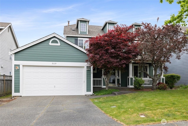 3119 52nd Pl NE, Tacoma, WA 98422 - view of front of home with concrete driveway, a front lawn, a porch, a garage, and a shingled roof