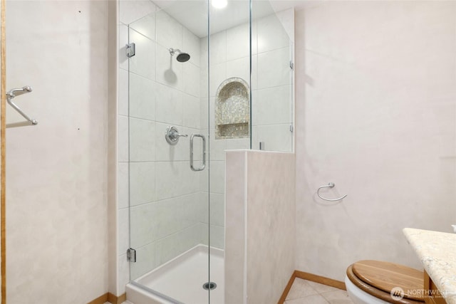 1006 N 36th St, Renton, WA 98056 - full bathroom featuring a stall shower, baseboards, toilet, and tile patterned floors