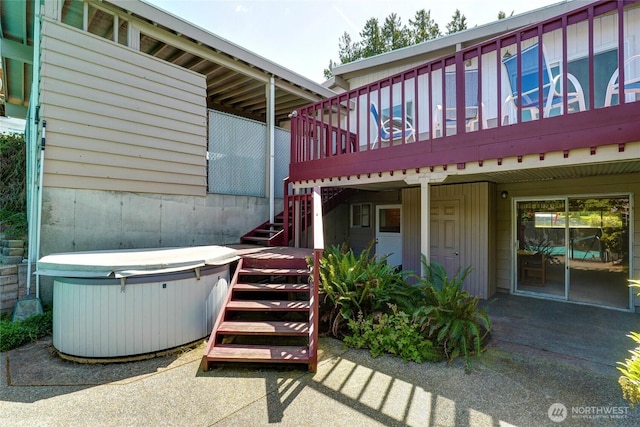 1006 N 36th St, Renton, WA 98056 - view of patio / terrace featuring a hot tub, stairs, and a deck