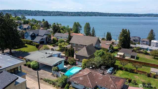 1006 N 36th St, Renton, WA 98056 - aerial perspective of suburban area featuring a pool area and a nearby body of water