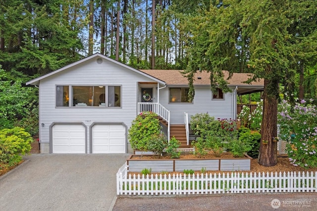 7517 Olympic View Dr, Edmonds, WA 98026 - single story home featuring asphalt driveway and an attached garage